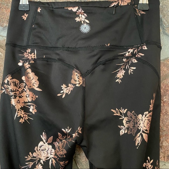 Black with gold floral athletic leggings. - Picture 4 of 6